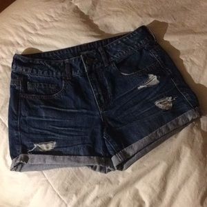 Dark wash denim shorts. Size 27 from Forever 21.
